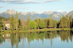 17 Bow River In The Early Morning With Mount Bourgeau, Mount Brett, Massive Mountain and Pilot Mountain Glow From Bow River Bridge In Banff In Summer.jpg